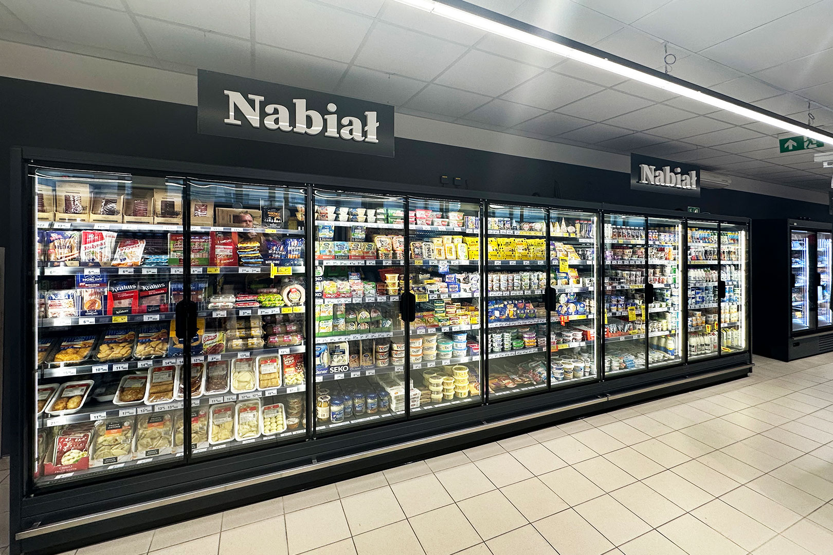 Refrigerated multideck cabinets Indiana 2 MV 090 MT D 205-DLM, convenience store Społem, Poland Refrigerated multideck cabinets Indiana 2 MV 090 MT D 205-DLM, convenience store Społem, Poland